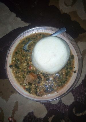 A picture of Tuwon shikafa with miyar zogale(Moringa soup).