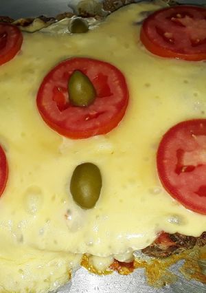 Una foto de Pollo a la pizza