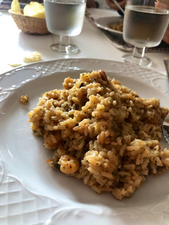 Una foto de Risotto de mar a la italiana con gambas y almejas