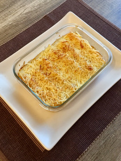 Una foto de Canelones de jamón y queso