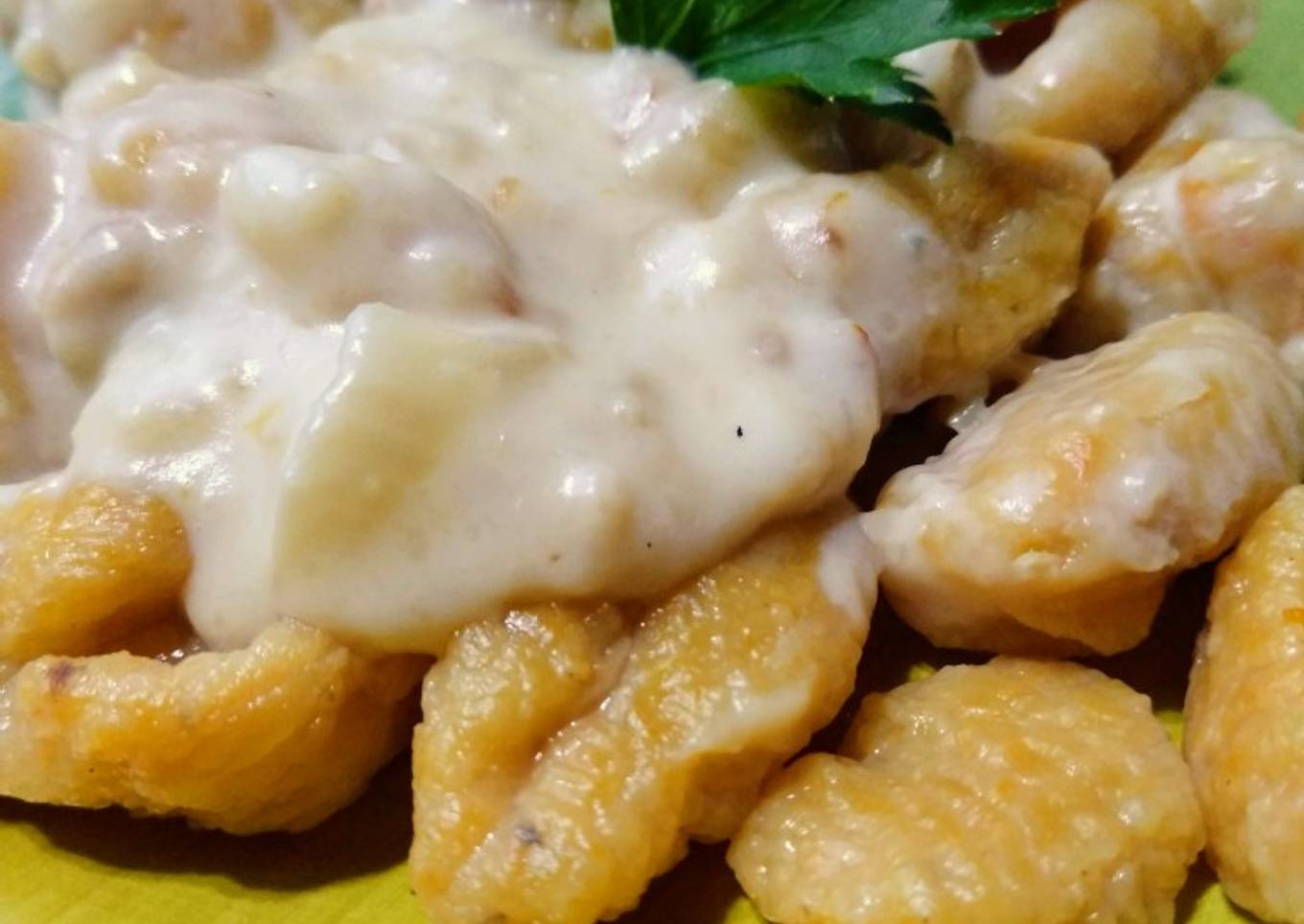 Ñoquis de calabaza con salsa de Roquefort