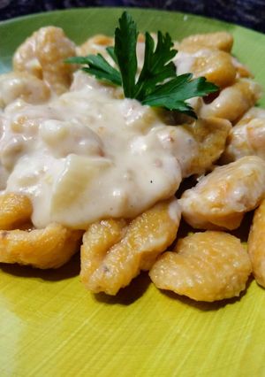 Una foto de Ñoquis de calabaza con salsa de Roquefort