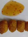 ক্রিস্পি চীজি চিকেন নাগেটস (crispy cheesy nuggets recipe in Bengali)