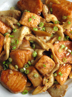 A picture of Salmon & Oyster Mushrooms with Garlic Butter & Soy Sauce.