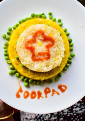 A picture of Two Tier Pulao Cake With Edible Cookpad Logo.