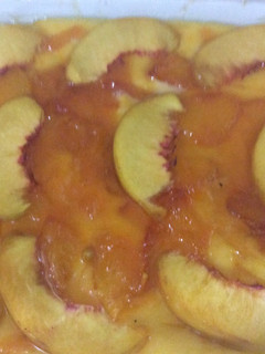 A picture of Biscuits custard with peach jam.