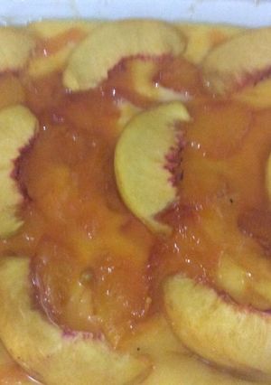 A picture of Biscuits custard with peach jam.