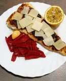 Filete de merluza con pimientos del piquillo y grana padano