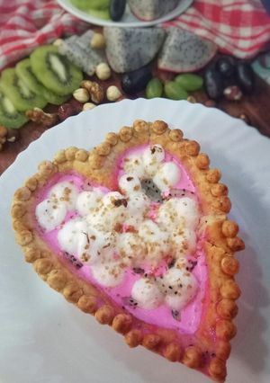 A picture of Dragon fruit custard with Meringue Hazelnut Tart.