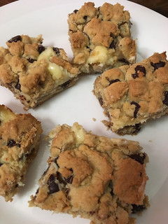 A picture of Chocolate chip cookie cheesecake bars.