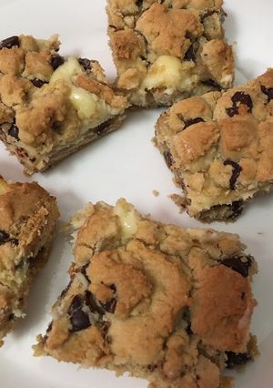 A picture of Chocolate chip cookie cheesecake bars.