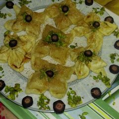 A picture of Flower shaped Pista Gujhia.