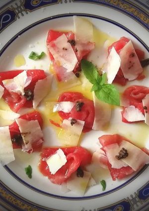 Foto principal de Bocaditos de Ternera con lascas de Parmesano y Aceite de trufa