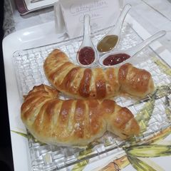 A picture of Caterpillar chicken rolls.