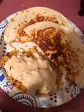 Nacho quesadillas and queso covered Spanish rice
