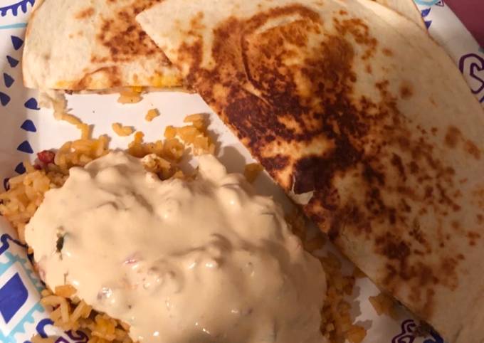 How to Prepare Andrew Copley Nacho quesadillas and queso covered Spanish rice