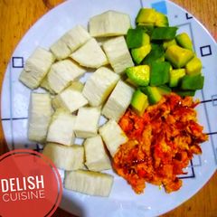 Boiled yam and egg sauce with avocado A picture of Boiled yam and egg sauce with avocado.