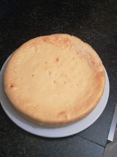 Foto principal de Tarta de queso con esencia de ron y coco rallado en la olla gm
