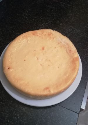 Una foto de Tarta de queso con esencia de ron y coco rallado en la olla gm