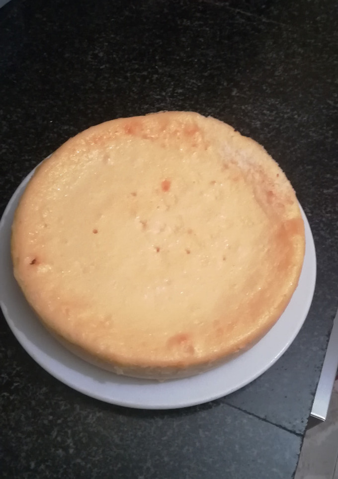 Una foto de Tarta de queso con esencia de ron y coco rallado en la olla gm