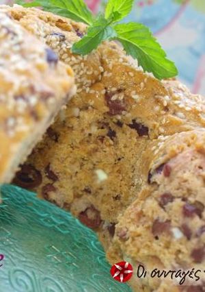 A picture of Cake with olives and feta cheese.