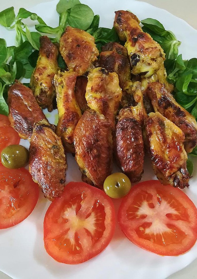 Una foto de Alitas de pollo al curry