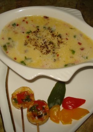 A picture of Red pumpkin soup.