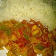 A picture of Shrimp sauce and rice.