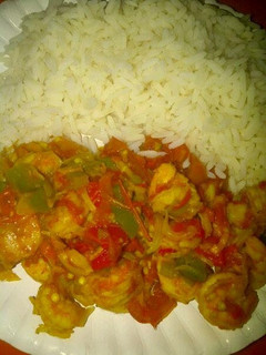 A picture of Shrimp sauce and rice.