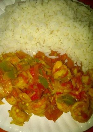 A picture of Shrimp sauce and rice.