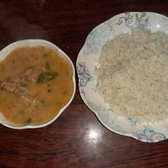 A picture of Chany ki daal chicken with chawal.