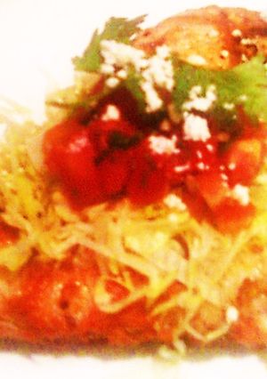 Una foto de Pollo pibil asado
