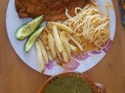 Una foto de spaghetti con pechuga de pollo