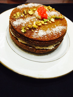 A picture of Kunafa with cream.