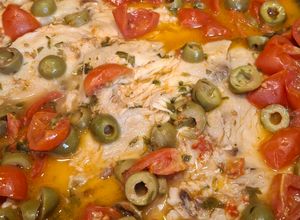 Foto di Pesce persico con pomodorini e olive