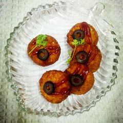 A picture of Cheesy rice kabab tikki.