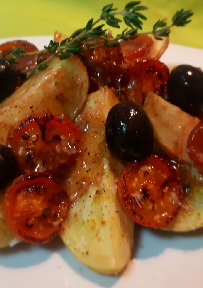 Una foto de Ensalada templada provenzal con vinagreta de grosella