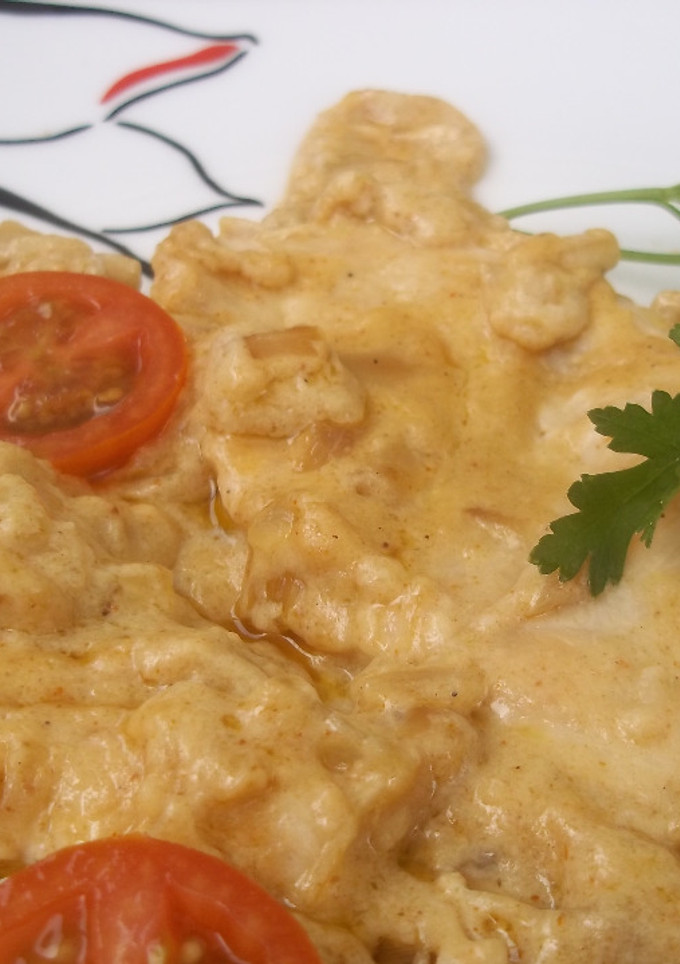 Una foto de Lomos de pechuga de pollo con bechamel y pimentón