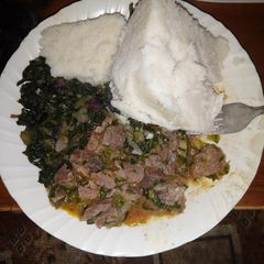 A picture of Beef,kales and ugali.