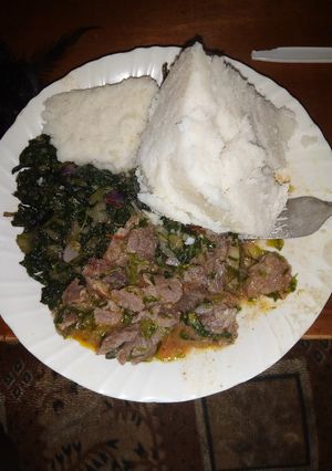 A picture of Beef,kales and ugali.