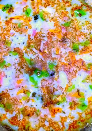 A picture of Rava veg dosa/utappam.