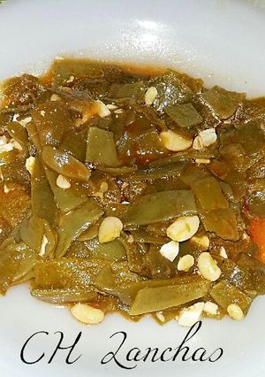 Foto principal de Judías verdes con huevo y salsa de tomate