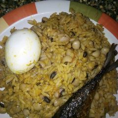 A picture of Jollof rice and beans.