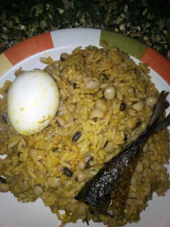 A picture of Jollof rice and beans.