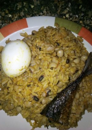 A picture of Jollof rice and beans.