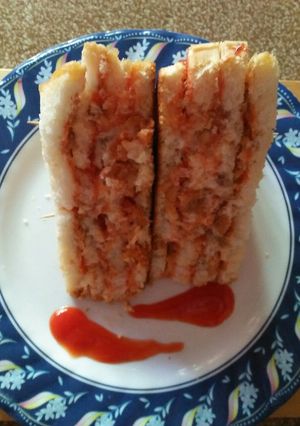 A picture of Cheesay chicken tikka sandwich.