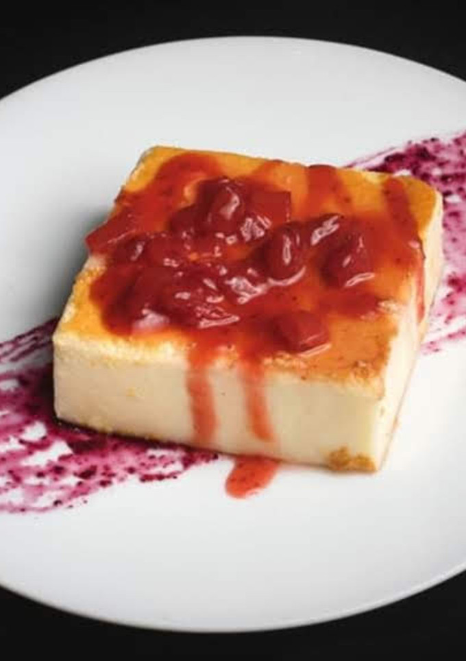 Una foto de Tarta de queso y frutos rojos