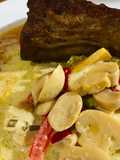 Colita cuadril con salsa de champiñones