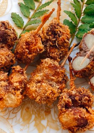 A picture of Japanese Garlic Kushiage (Fried Garlic Skewers).