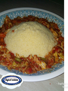 A picture of Couscous and vegetable soup.